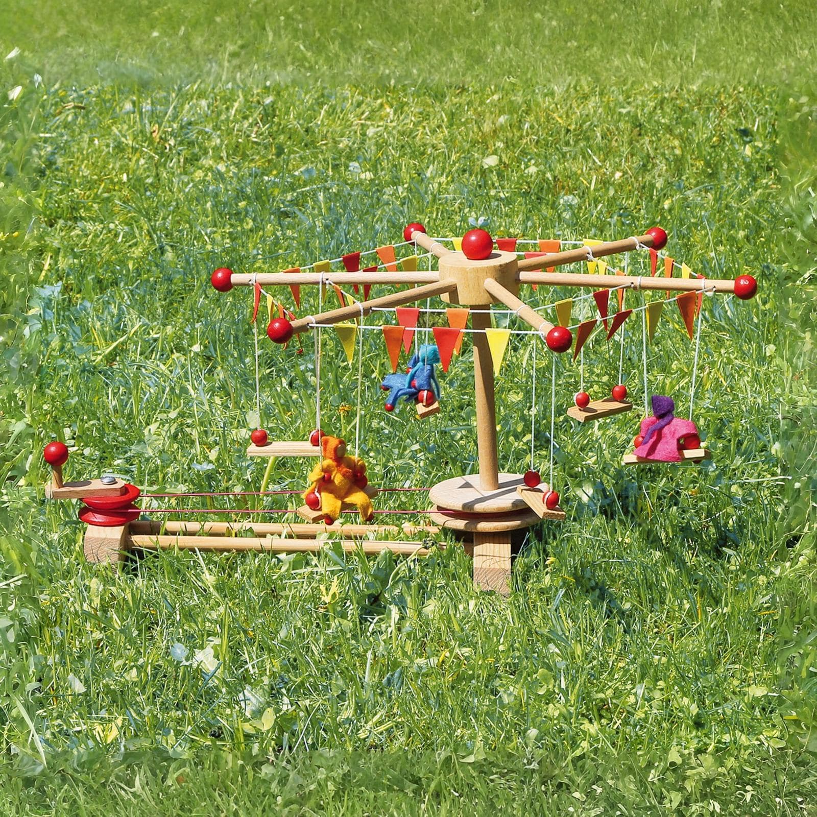 Kraul Spielzeug Kettenkarussell mit 3 PÃ¼ppchen